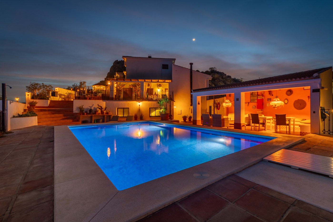 Casa La Calera at dusk with swimming pool